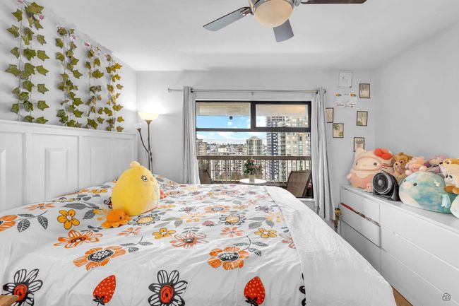 Bedroom with access to outside and ceiling fan | Image 22
