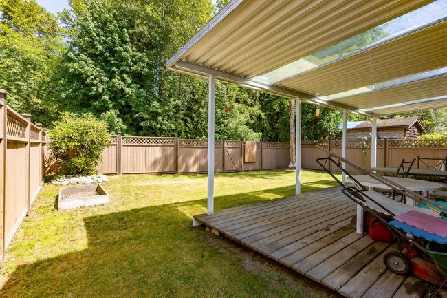 View of yard with a deck | Image 26