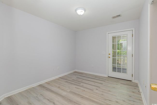 Spacious closet featuring wood finished floors | Image 18