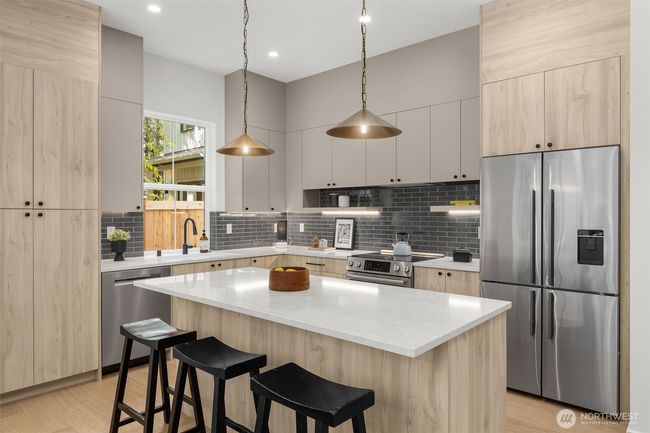 Dining area leads to spacious patio and immaculately landscaped back yard | Image 17