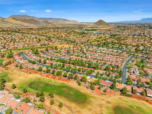 Experience premier golf & resort-style living in the renowned Sun City Summerlin community, offering four exceptional recreation centers, three championship golf courses, indoor and outdoor pools, a state-of-the-art theater, fully equipped fitness centers, pickleball and tennis courts, a softball field, and an active social calendar designed for vibrant living. Ideally located just minutes from Downtown Summerlin’s upscale shopping and dining, the iconic Las Vegas Strip | Image 38