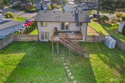 Super roomy back yard - with a setup for entertaining, relaxing, and play! | Image 2