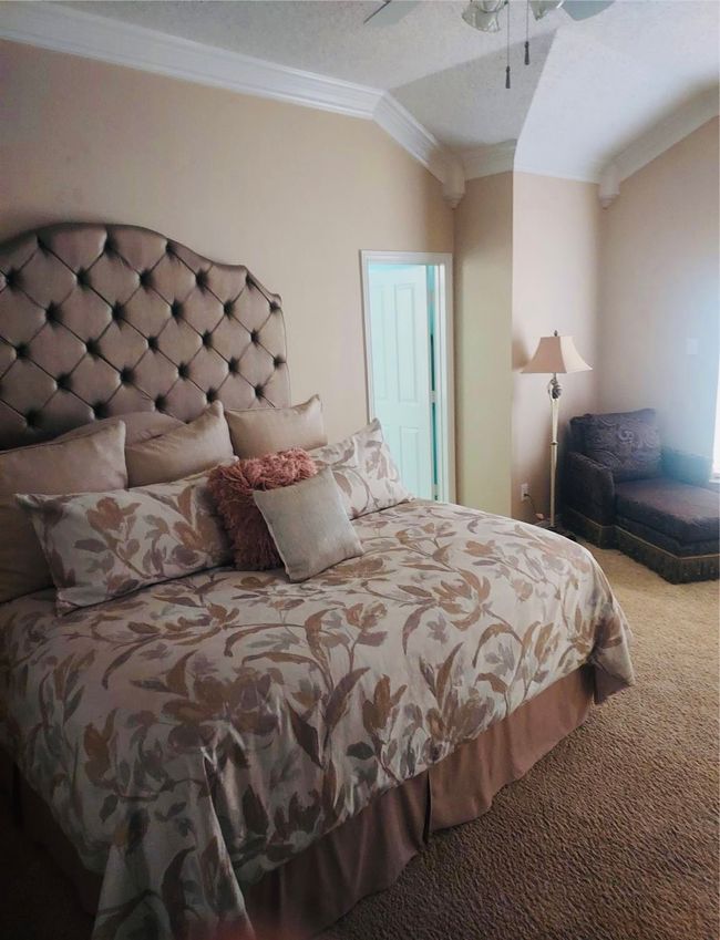 Owner's Ensuite features a huge bedroom with crown molding and plenty of natural​​‌​​​​‌​​‌‌​‌‌​​​‌‌​​‌‌​‌​​​​​‌ light. | Image 23