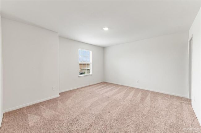 Empty room featuring light colored carpet and baseboards | Image 35