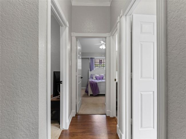 Hallway to additional bedrooms | Image 32