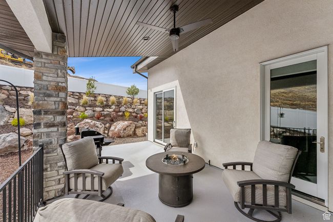 View of patio / terrace featuring an outdoor fire pit | Image 59