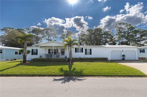 327 Papaya Cir, Barefoot Bay, FL, 32976-6850 | Card Image