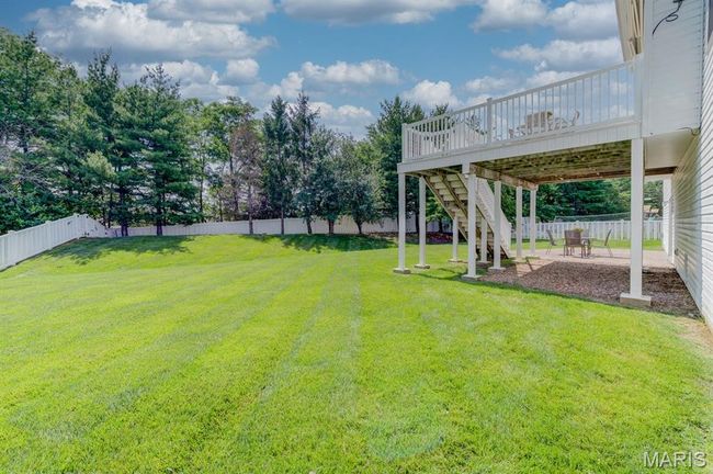 The fenced backyard is amply endowed. | Image 38