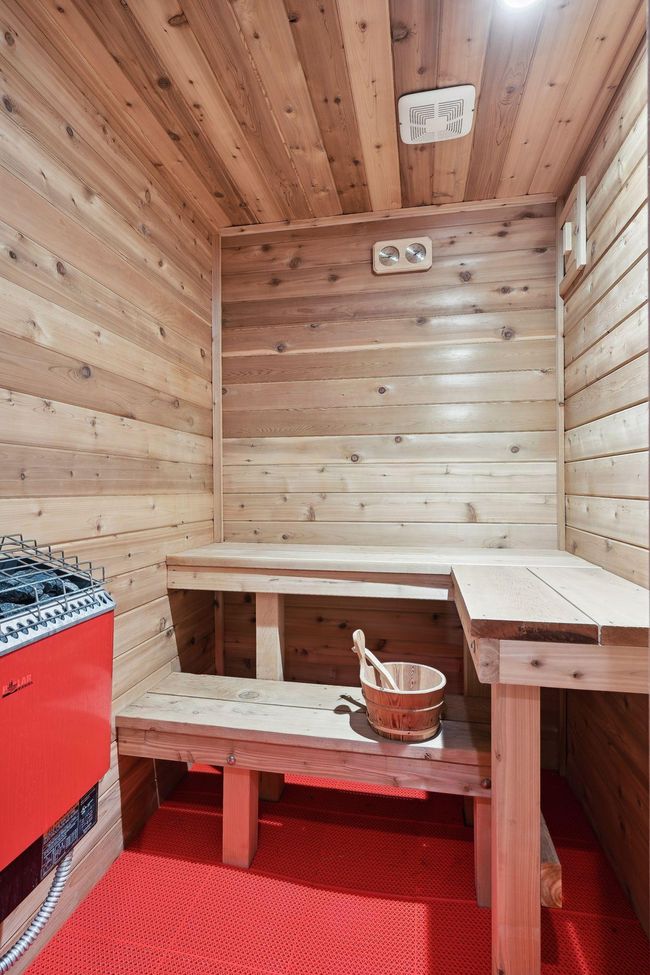 Escape to your private retreat with this magnificent in-home sauna that invites you to unwind, detoxify, and melt away the stresses of the day in unparalleled comfort. | Image 22