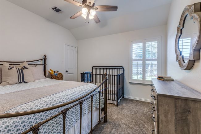Bedroom number 4 large enough for queen bed and baby bed. Ceiling fan and large closet. | Image 20