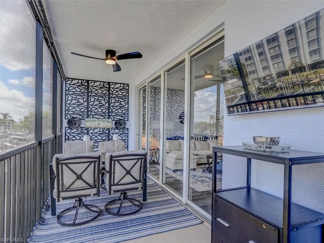 SCREENED LANAI. WALL-MOUNTED TELEVISION. | Image 19