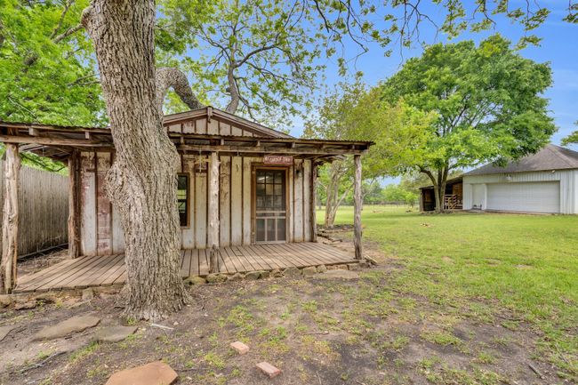 SO much history here in this Potting Shed! Has electricity and water. There are so many possibilities for this space, including a pool house or a large playhouse for kids! | Image 34