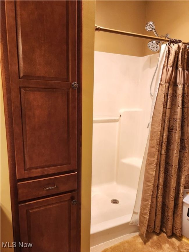 Full bath with a shower with shower curtain | Image 25