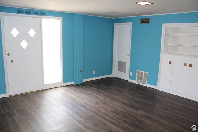 Entrance foyer with dark wood-style flooring | Image 14