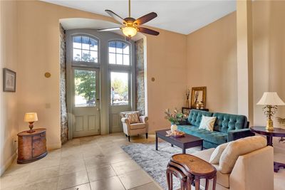 Original Stone Framing Glass Paned Entry Door, Tile and Neutral Paint Throughout | Image 3