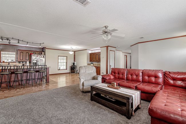 Main house- view of kithcne/dining from living area | Image 6