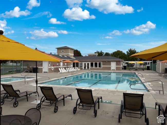 Community pool featuring a patio | Image 4
