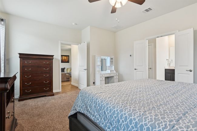 Carpeted bedroom with baseboards and ceiling fan | Image 30