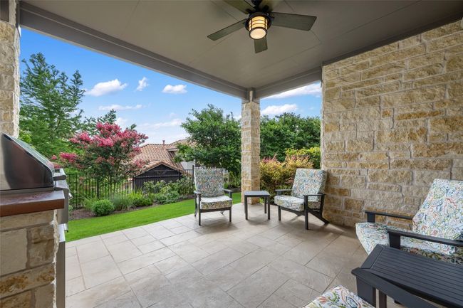 View of patio featuring a ceiling fan | Image 31