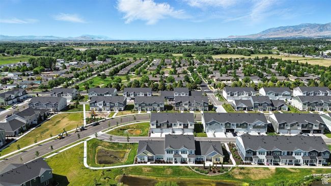 Aerial perspective of suburban area featuring a mountain backdrop | Image 27