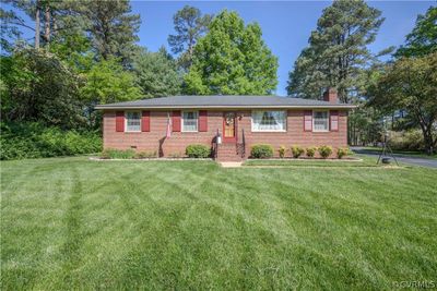 Ranch-style house with a front yard | Image 3