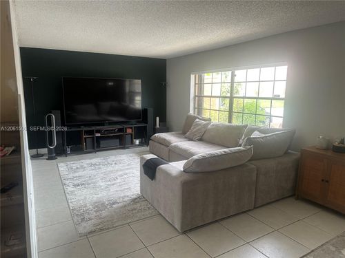 62 Spinning Wheel Ln, Tamarac, FL, 33319-2483 | Card Image