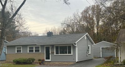 View of front of home with a garage | Image 1