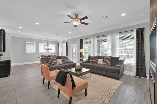 Family room offers plenty of space to entertain & overlooks the pool. Never lose sight of the kids in the pool | Image 6