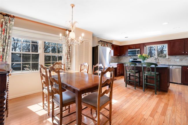 Kitchen featuring generously sized breakfast area | Image 15