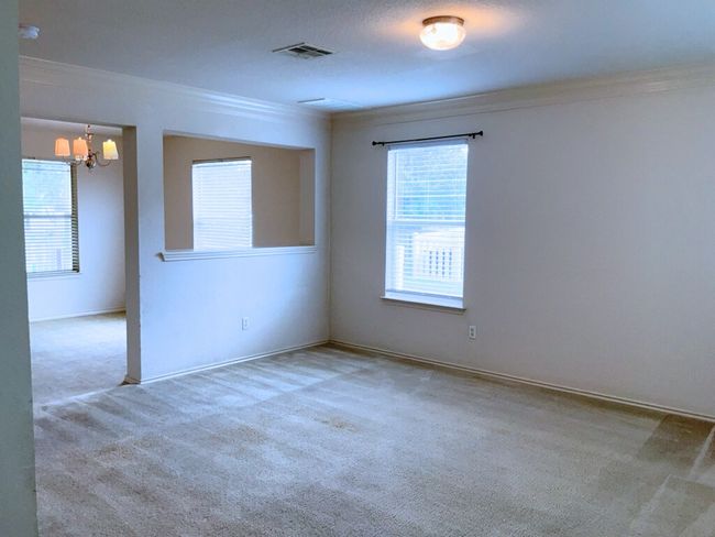 Living room with crown molding | Image 6