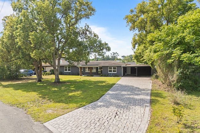 Long Paver Driveway & 3 Car Carport | Image 35
