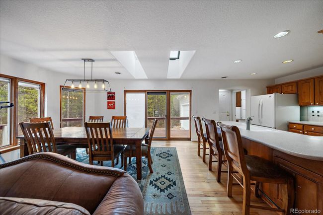 Kitchen Peninsula Seating and Dining Area | Image 14