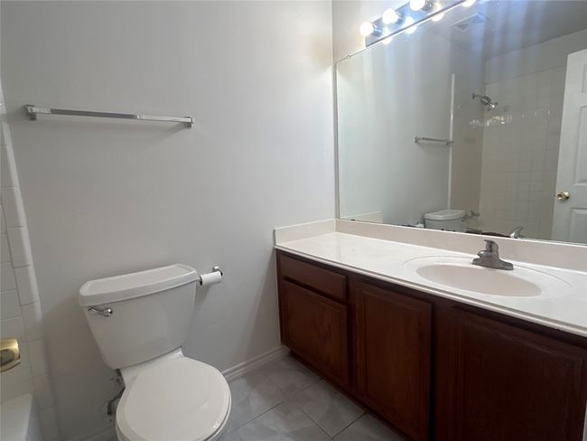 Hallway bathroom that is situated near 3 secondary bedrooms is conveniently accessible | Image 7