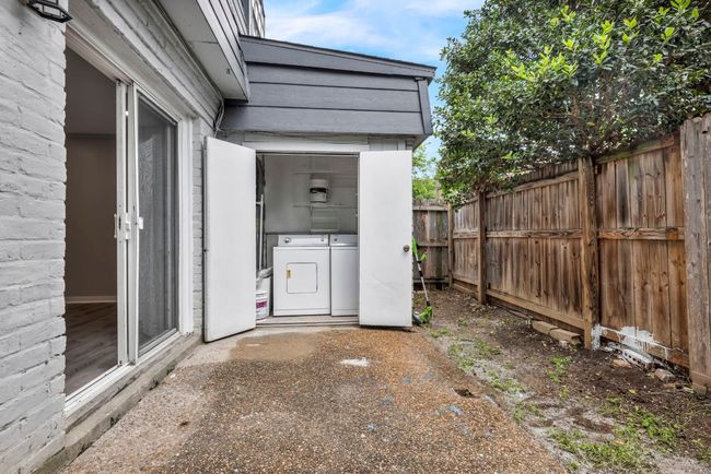 View of patio / terrace with separate washer and dryer | Image 21