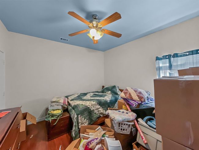 Secondary bedroom on 1st floor (pardon our mess...we're packing to move!) | Image 13