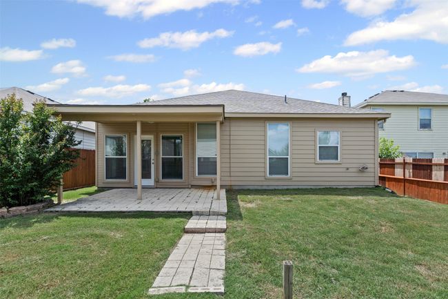 Back of property featuring a fenced backyard and a patio | Image 32