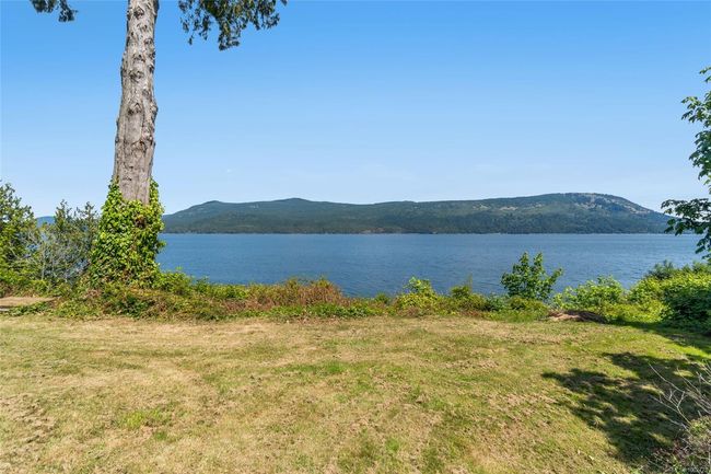 Water view featuring a mountainous background | Image 60
