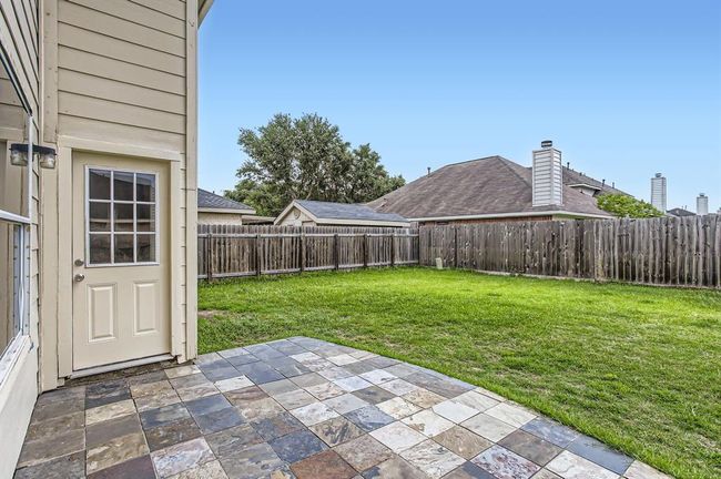 Beautiful natural slate tile patio. | Image 35