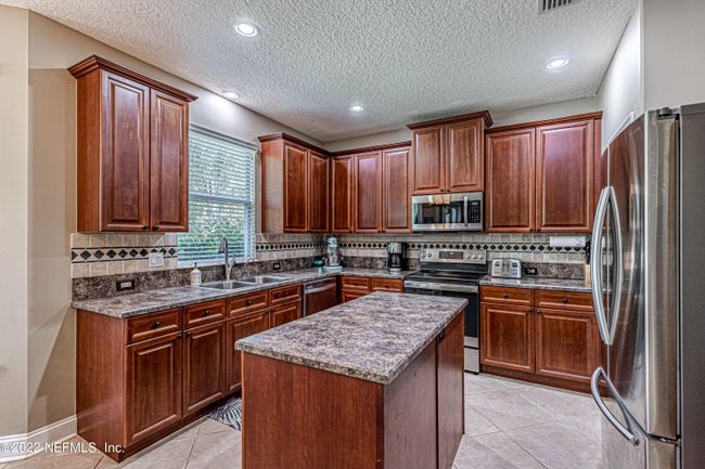 883 Songbird Dr, House other with 5 bedrooms, 3 bathrooms and null parking in Orange Park FL | Image 19
