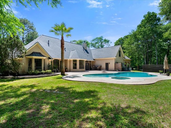 Picture perfect from every angle—this backyard was made for hosting, relaxing, and enjoying nature without ever leaving home. | Image 45