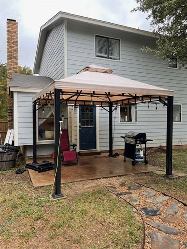 Rear view of house featuring a gazebo and a patio | Image 13