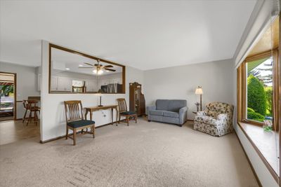 Main floor living room w/ bay window. | Image 3