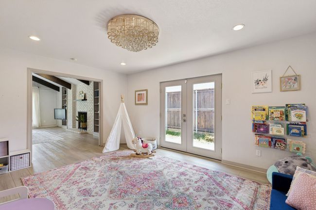 Formal dining currently serving as family playroom | Image 12