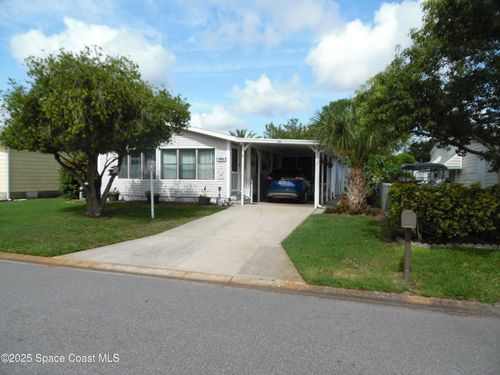 715 Gladiolus Dr, Barefoot Bay, FL, 32976-7670 | Card Image