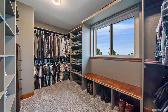 Primary Bedroom Walk-in closet, natural light | Image 21