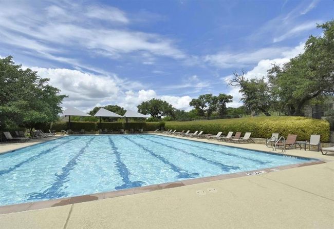 Community pool featuring a patio | Image 34