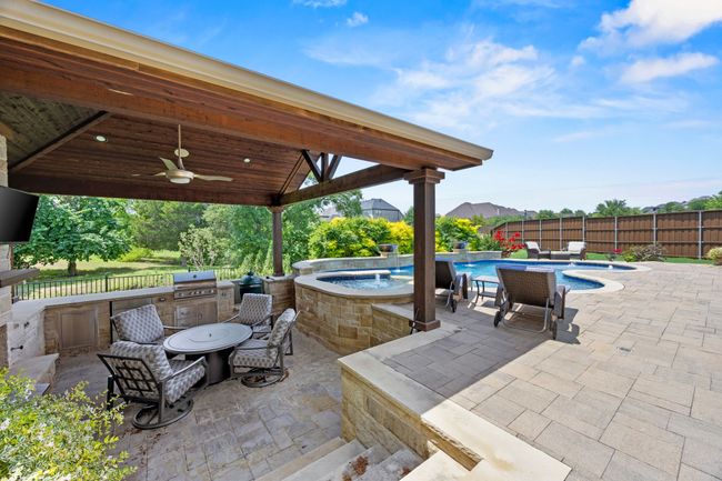 Outdoor kitchen with built in grill and green egg! | Image 36