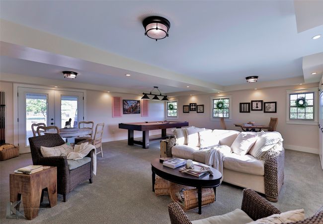 Living room with carpet flooring, recessed lighting, french doors, and billiards | Image 15
