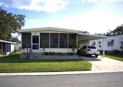 Welcoming and Well-Kept Front Exterior | Image 1