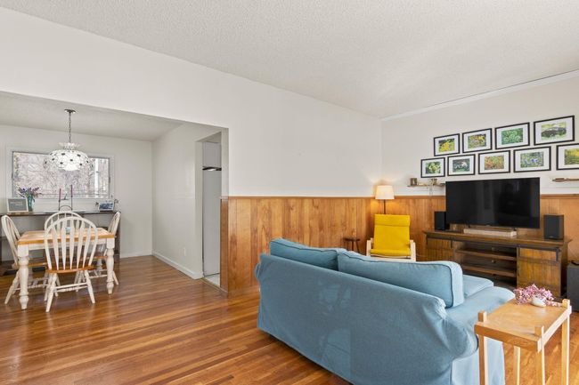 Open Living area hardwood floors, wainscoting | Image 6